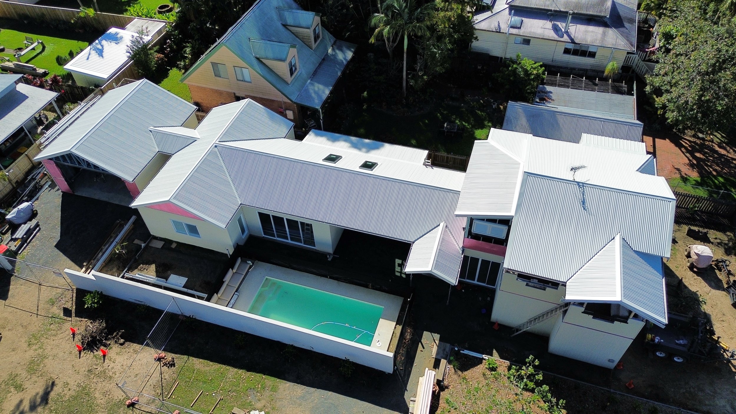Aerial view of completed roof on modern home
